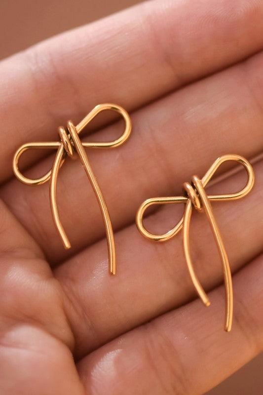Whimsy Bow Earrings - Real Gold Dipped Stainless Steel, Minimalist Jewelry
Looking for a thoughtful gift or a little self-treat for everyday sparkle? These cute, simple bow earrings make a perfect present for birthdays, anniversaries, Mother's Day, or just because - and they slip easily from school runs to work meetings and weekend coffee dates.
Design Story
Delicate ribbon inspiration
- Tiny bowknot silhouette, designed to read feminine and polished without feeling fussy
- Real gold dipped finish over stai