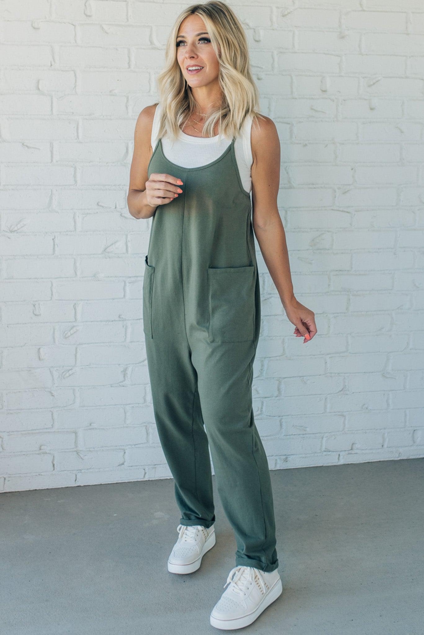 Blonde Woman wearing a white tank with a solid Cotton Relaxed Cami Jumpsuit.
