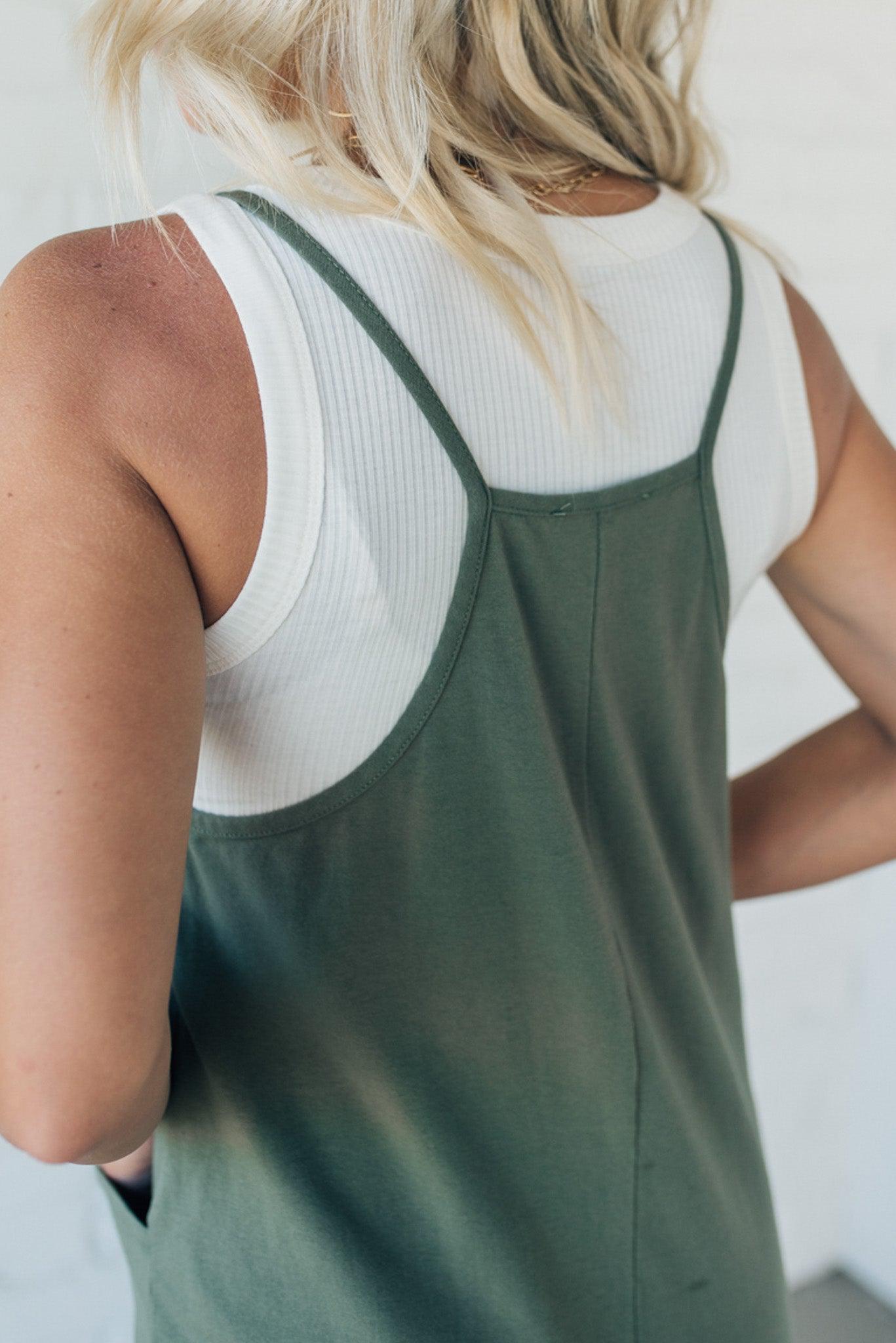 Blonde Woman wearing a white tank with a solid Cotton Relaxed Cami Jumpsuit.