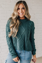 Blonde girl modeling a mocha long sleeve cable knit sweater