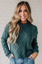 Blonde girl modeling a mocha long sleeve cable knit sweater