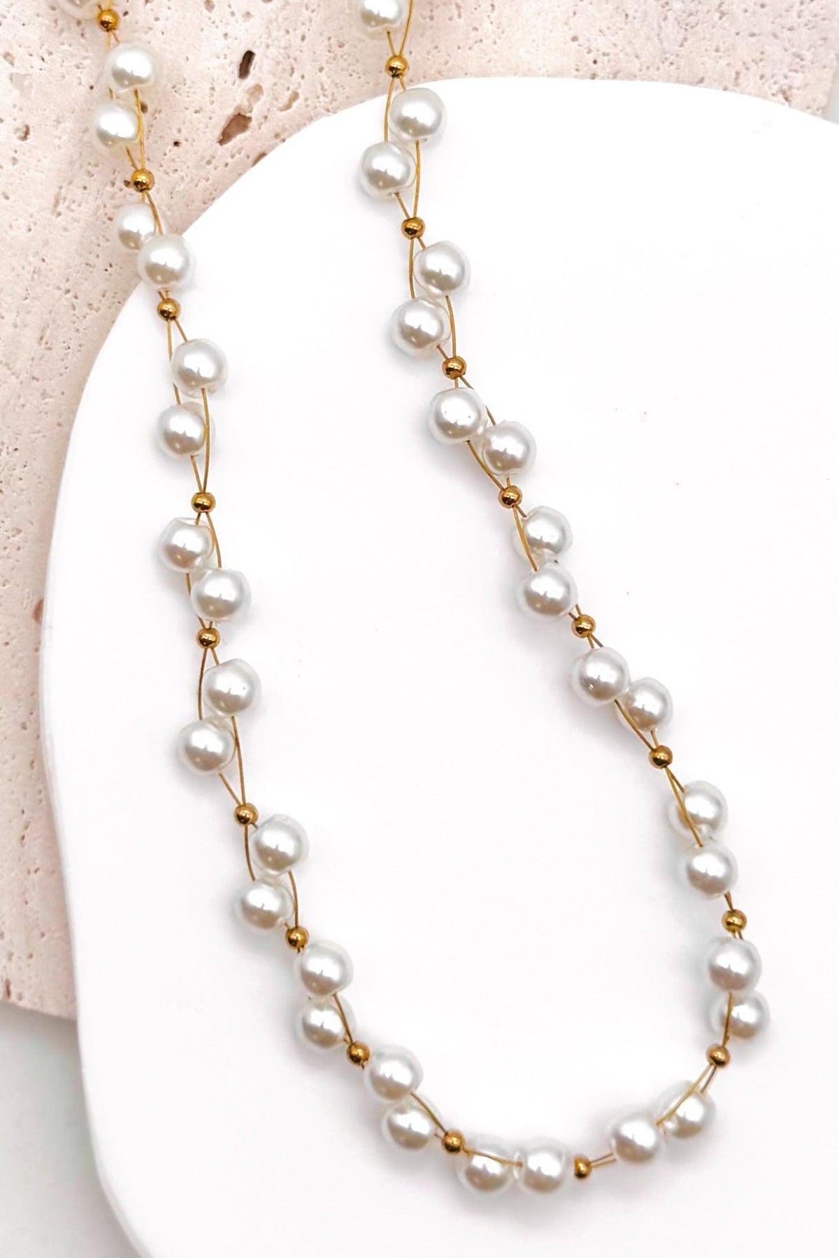 Delicate Gold Wire & Bead Accents: Features fine gold-tone wire connections accented with small polished gold bead spacers for a light, floating effect.