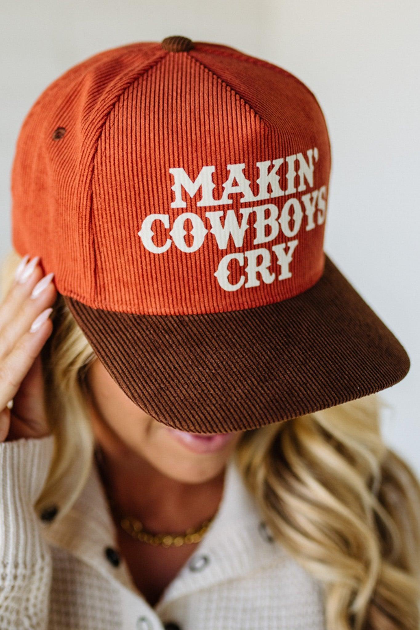 Person wearing a rust and brown cap with 'Makin' Cowboys Cry' text.