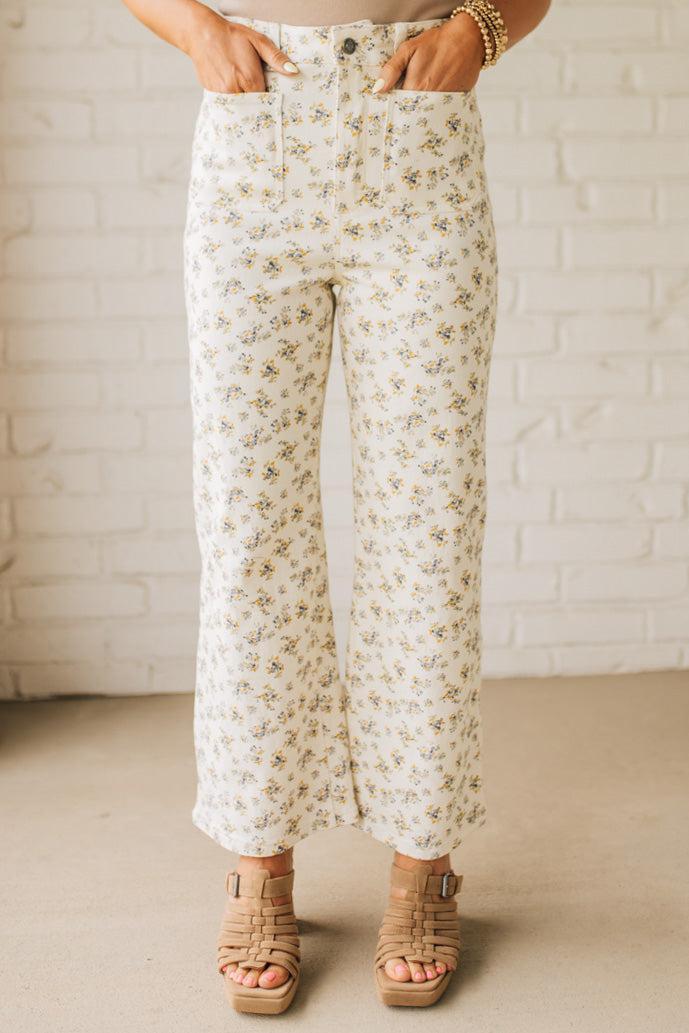 Blonde woman wearing Ditsy Floral Printed Front Pocket Stretch Wide Leg Jeans.