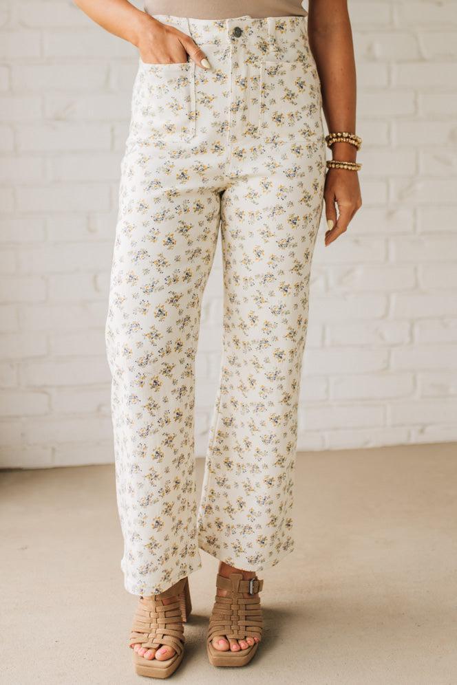 Blonde woman wearing Ditsy Floral Printed Front Pocket Stretch Wide Leg Jeans.