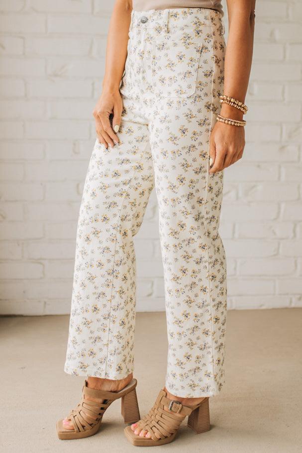 Blonde woman wearing Ditsy Floral Printed Front Pocket Stretch Wide Leg Jeans.