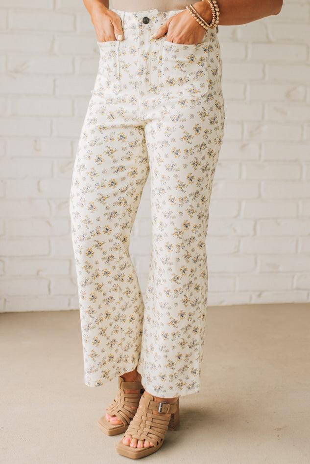 Blonde woman wearing Ditsy Floral Printed Front Pocket Stretch Wide Leg Jeans.