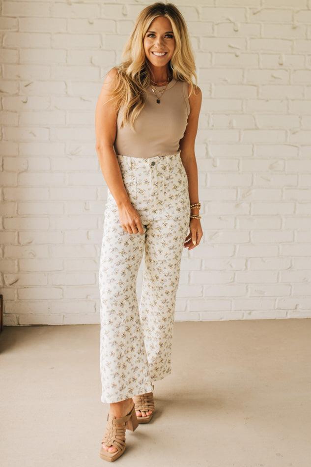Blonde woman wearing Ditsy Floral Printed Front Pocket Stretch Wide Leg Jeans.