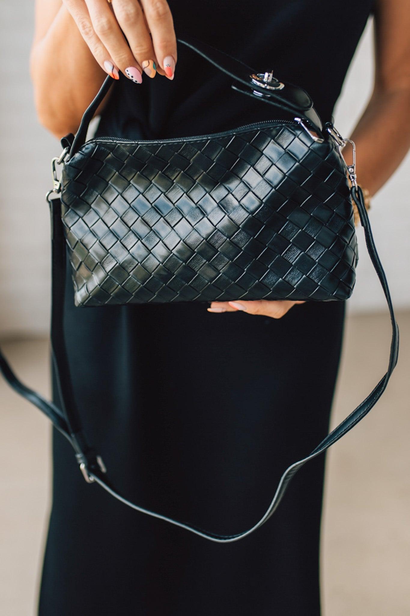 Blonde woman in a black dress with a Convertible Woven Crossbody Handbag in balck vegan leather.