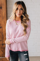 BLONDE WOMAN MODELING A LONG SLEEVE STRIPED LIGHTWEIGHT SWEATER WITH RIBBED SOLID COLORED NECKLINE AND SLEEVE CUFFS
