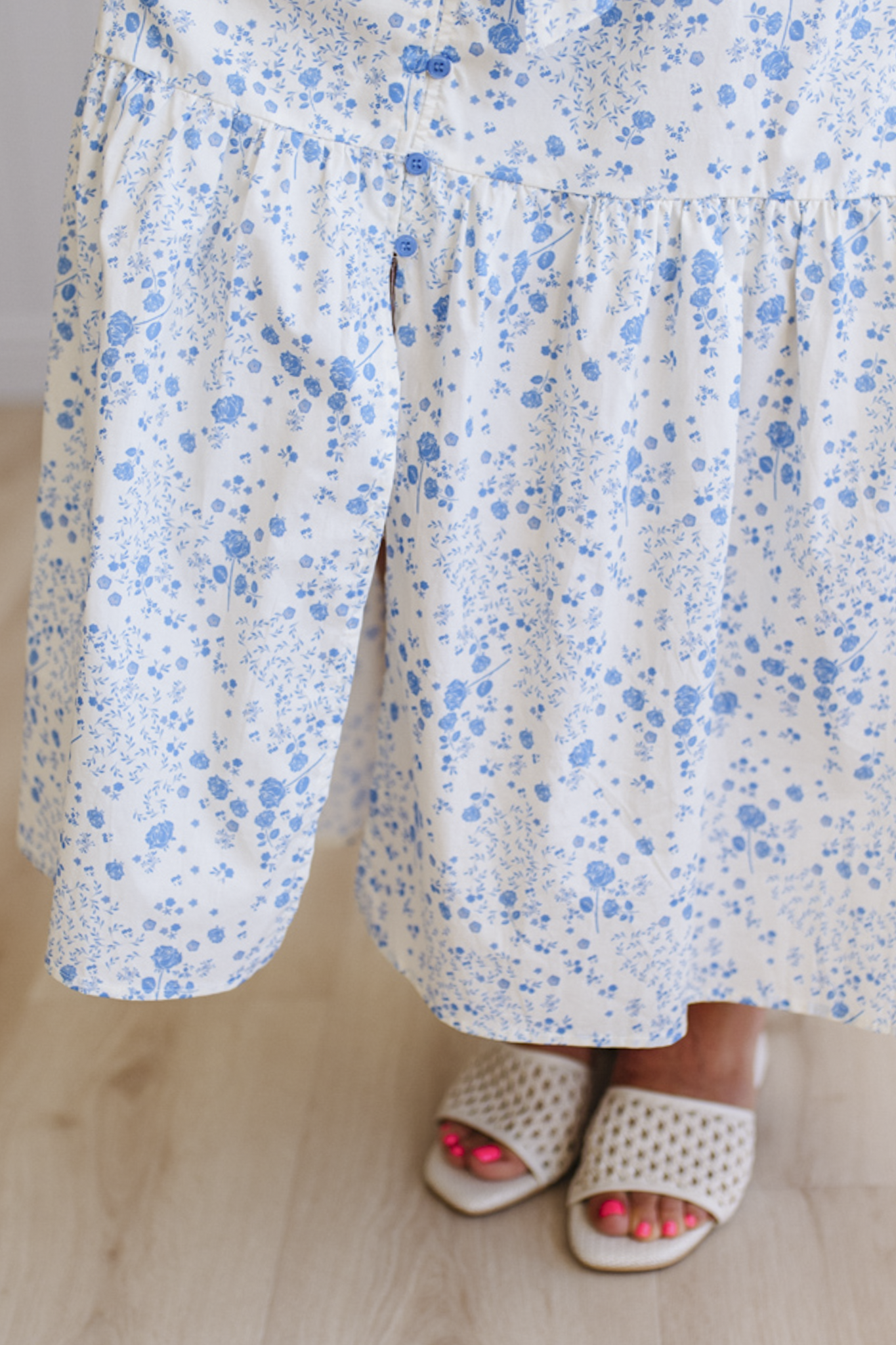 Floral dress with blue flowers on a white background