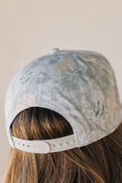Blonde woman wearing a Howdy Darlin' Embroidery Patch Camo Trucker Hat.