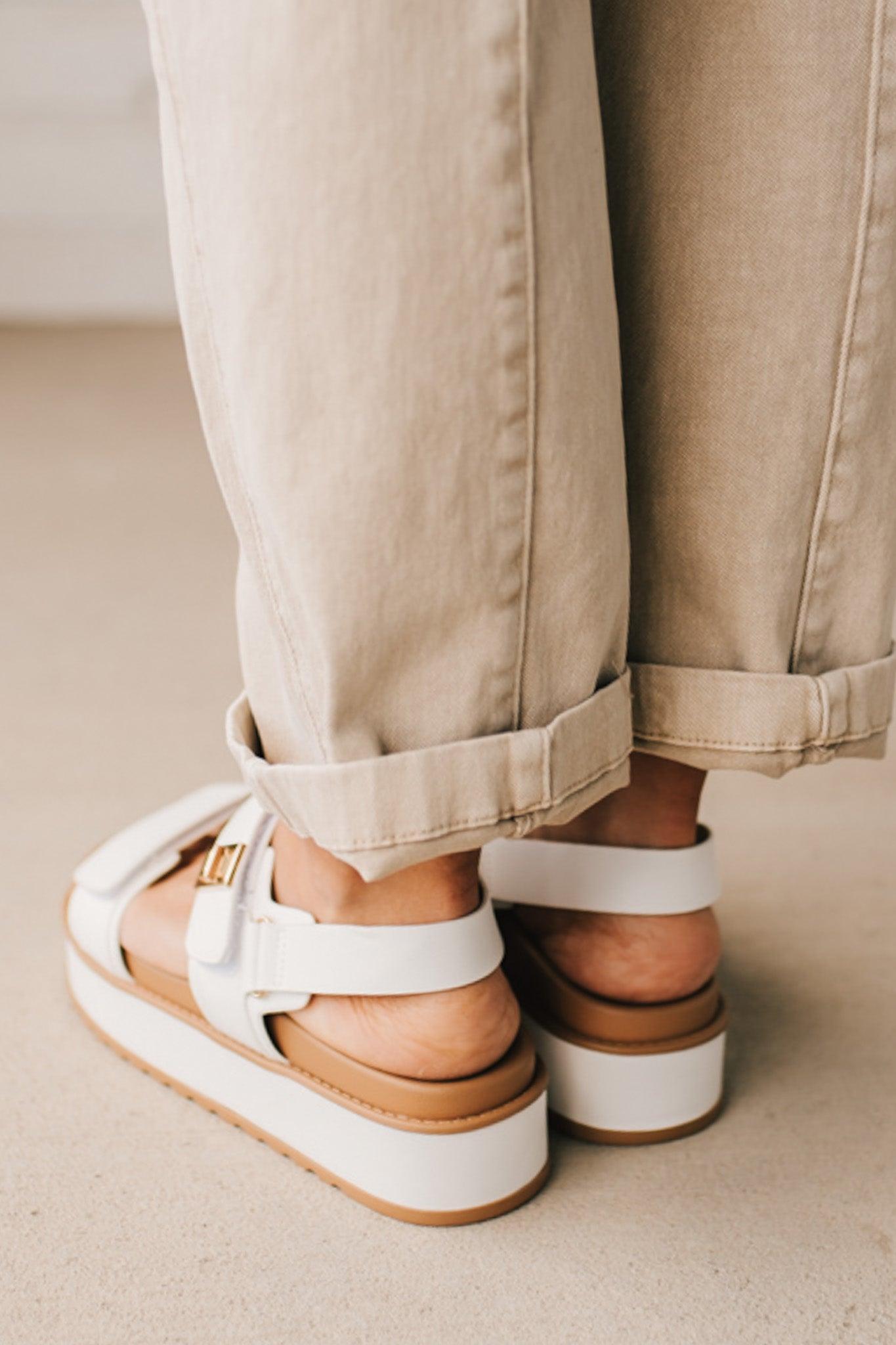 WHITE VELCRO STRAP CHUNKY SANDALS WITH SLINGBACK AND GOLD ACCENTS.