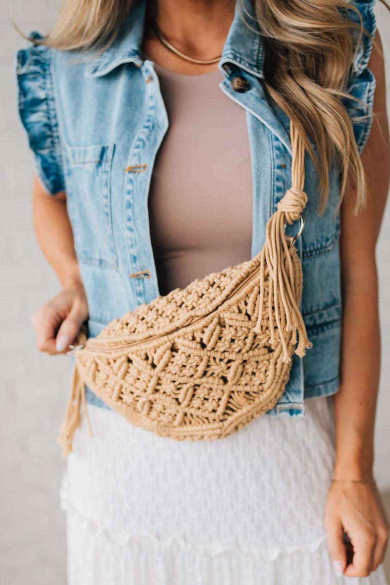 Blonde woman wearing a Woven Macrame Design crossbody bag.