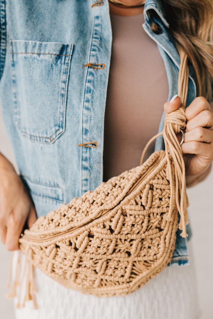 Blonde woman wearing a Woven Macrame Design crossbody bag.