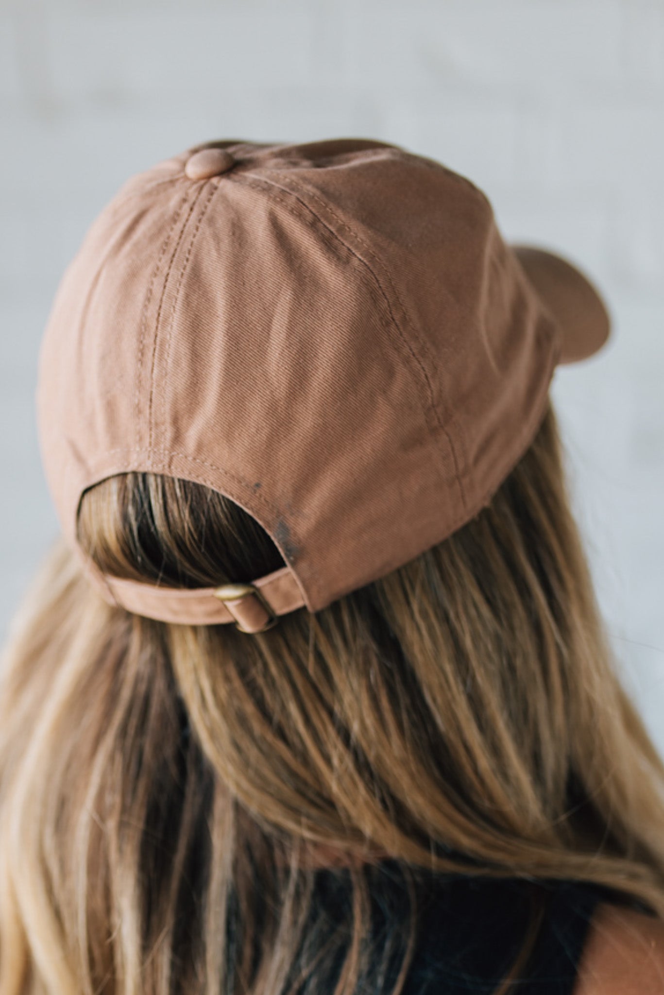 Blonde Woman Wearing a Mama Letters Embroidered Letters Baseball Cap
