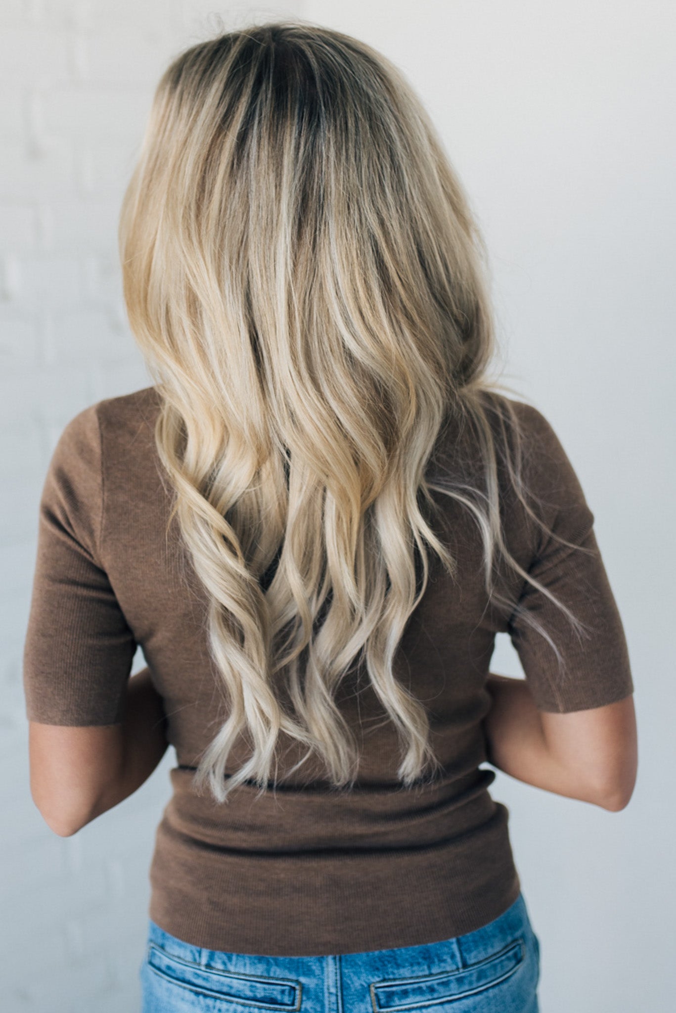 Blonde woman wearing half sleeve lightweight viscose sweater tee.