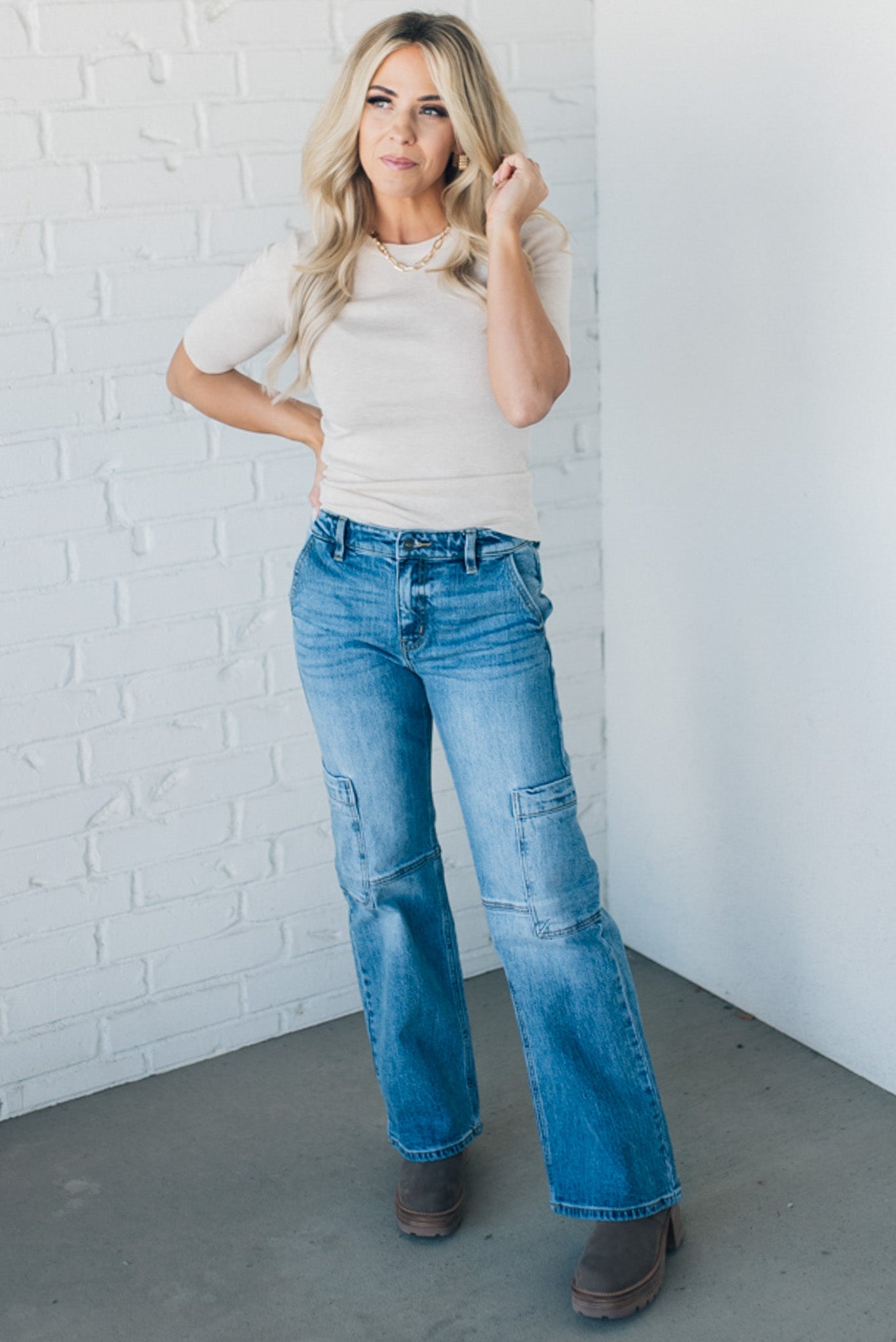 Blonde woman wearing half sleeve lightweight viscose sweater tee.