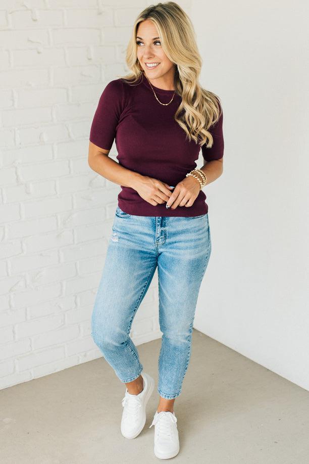 Blonde woman wearing half sleeve lightweight viscose sweater tee.