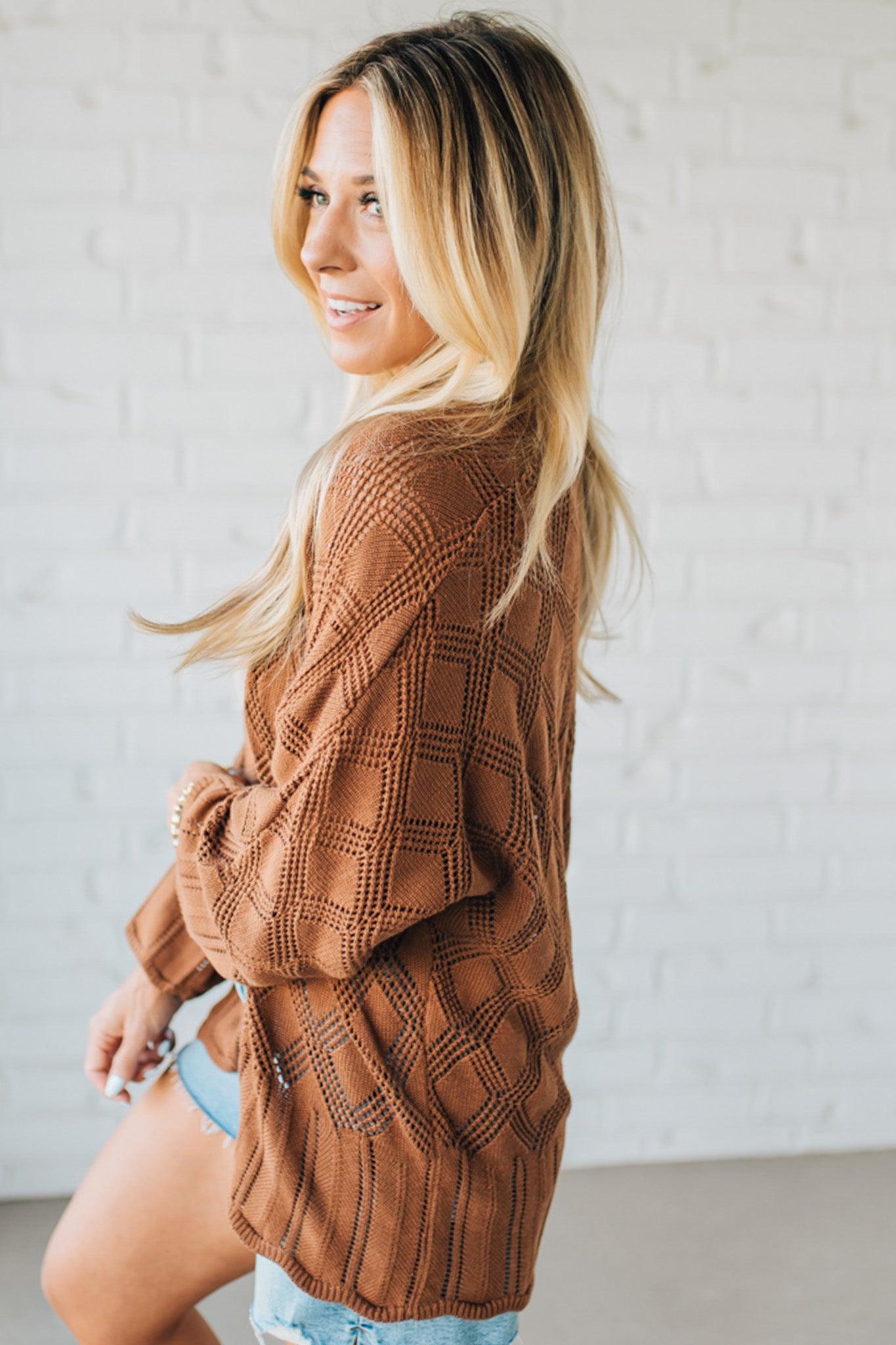 Blonde Model Wearing A Lightweight Crochet Cardigan With Scallop Hem.
