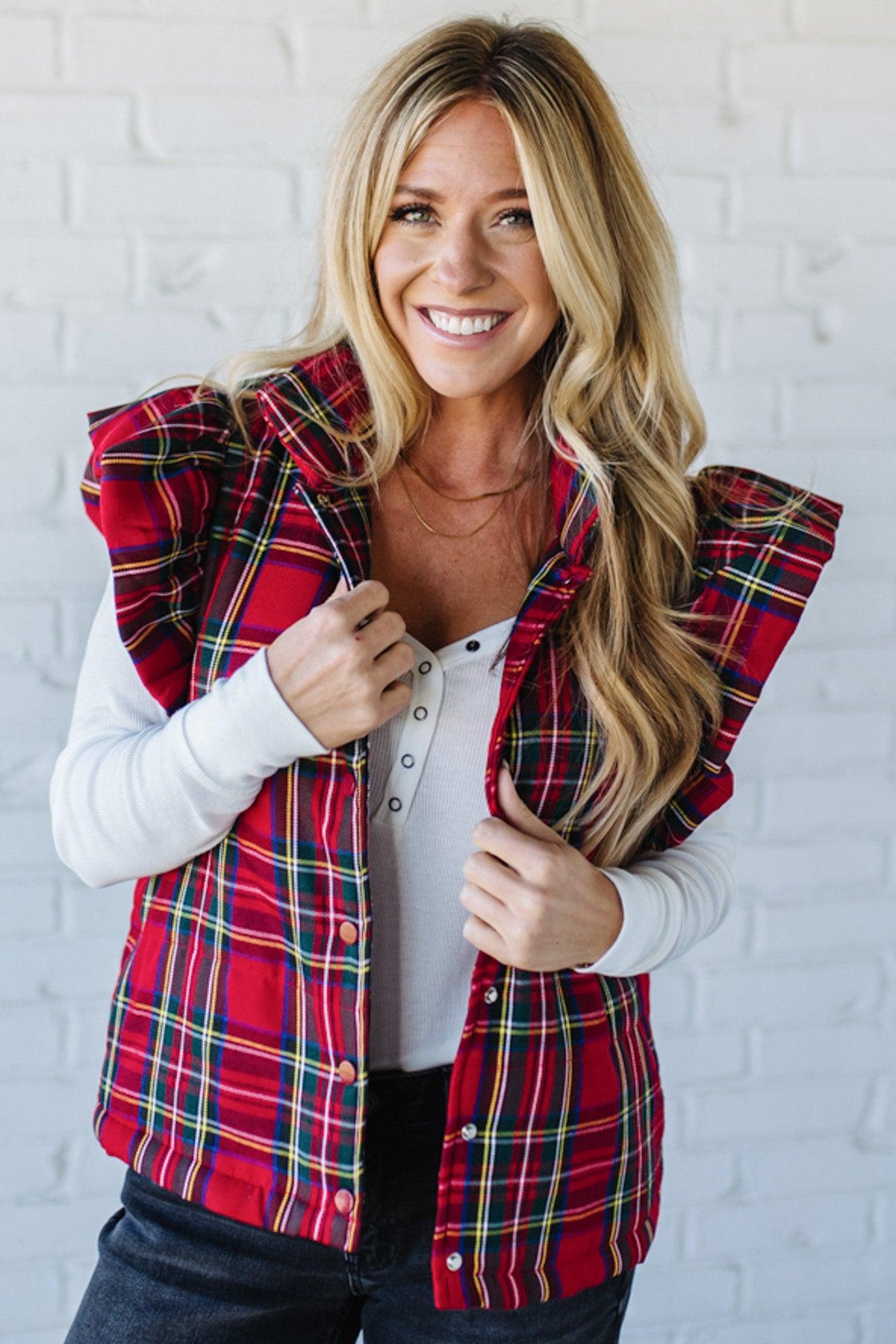 Blonde Woman Wearing a Red Christmas Plaid Ruffled Puffer Vest.