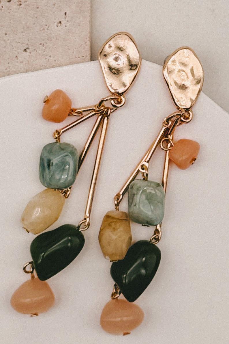 Cascade Bead Dangling Earrings with green and peach rocks, and shiny gold studs.