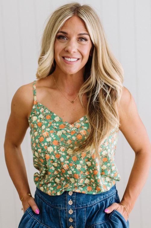 Blonde Woman Wearing a V Neck Floral Printed Tank Top.