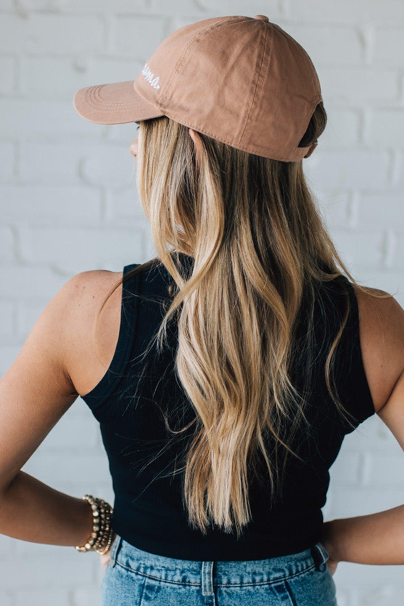 Blonde Woman Wearing a Solid Basic Cotton Garment Dyed Round Neck Tank Top.