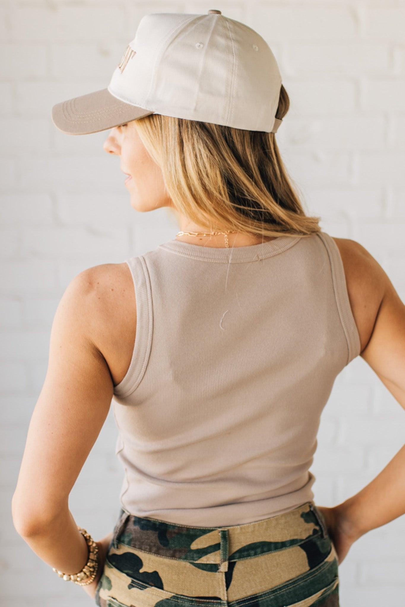 Blonde Woman Wearing a Solid Basic Cotton Garment Dyed Round Neck Tank Top.