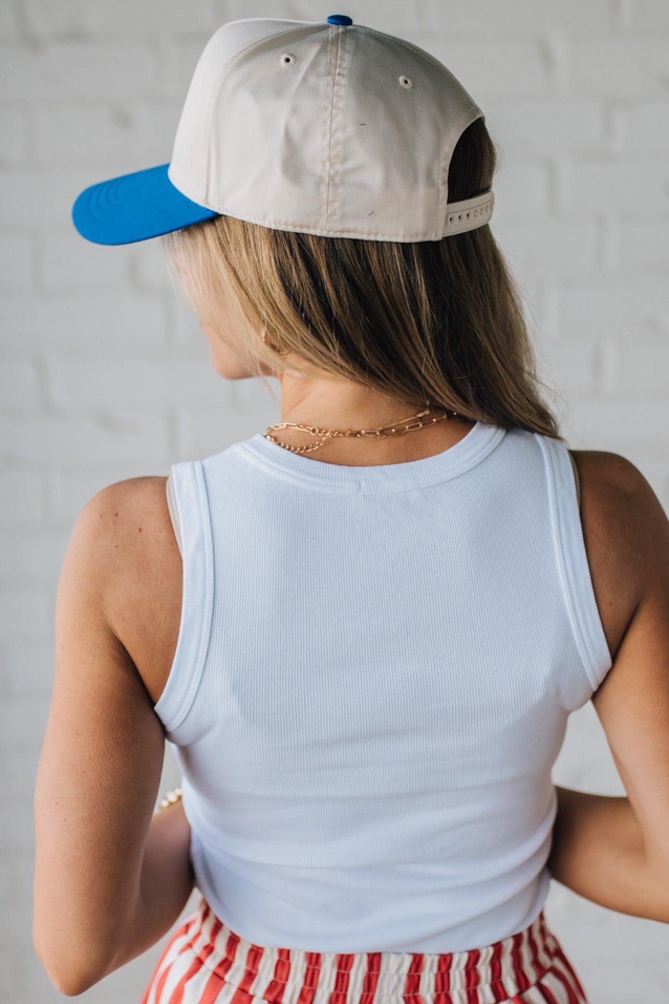 Blonde Woman Wearing a Solid Basic Cotton Garment Dyed Round Neck Tank Top.