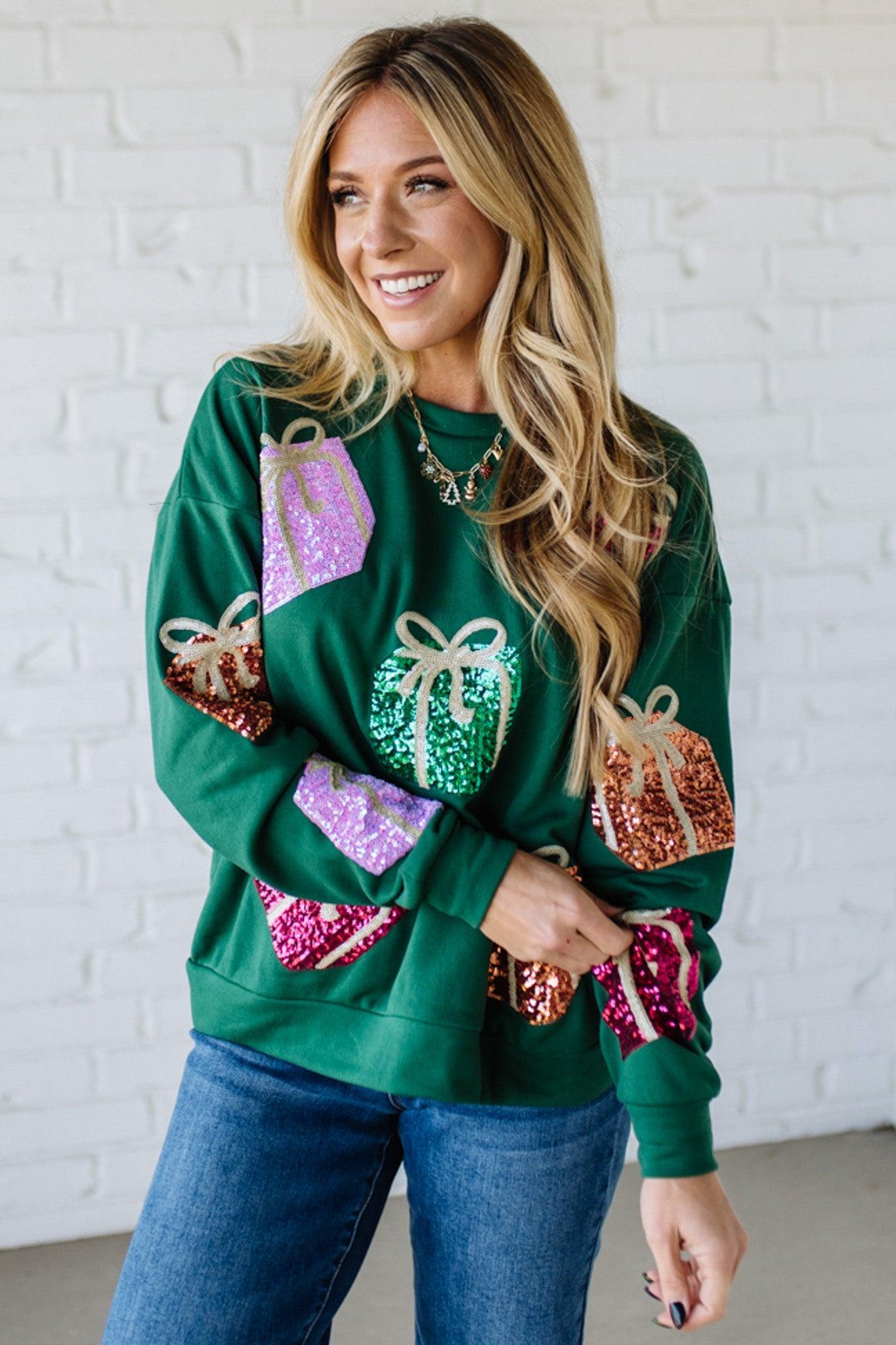 Blonde Woman Wearing a Sequin Christmas Gift Box Embroidered Pullover