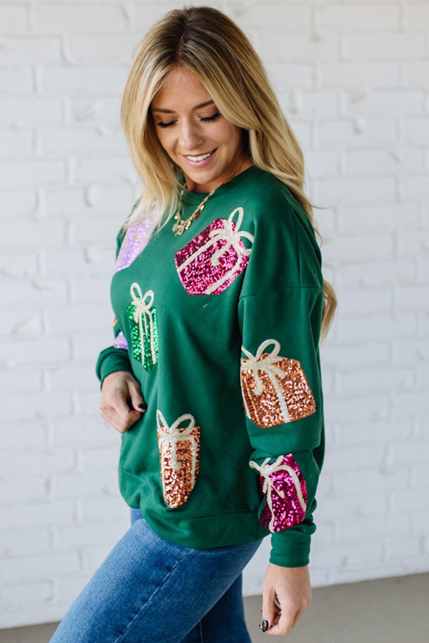 Blonde Woman Wearing a Sequin Christmas Gift Box Embroidered Pullover