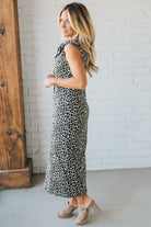 Blonde Woman Wearing a Button Front Maxi Leopard Denim Shirt Dress.