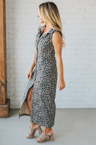 Blonde Woman Wearing a Button Front Maxi Leopard Denim Shirt Dress.