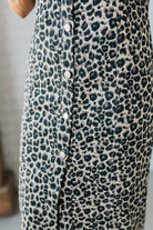 Blonde Woman Wearing a Button Front Maxi Leopard Denim Shirt Dress.