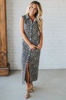 Blonde Woman Wearing a Button Front Maxi Leopard Denim Shirt Dress.
