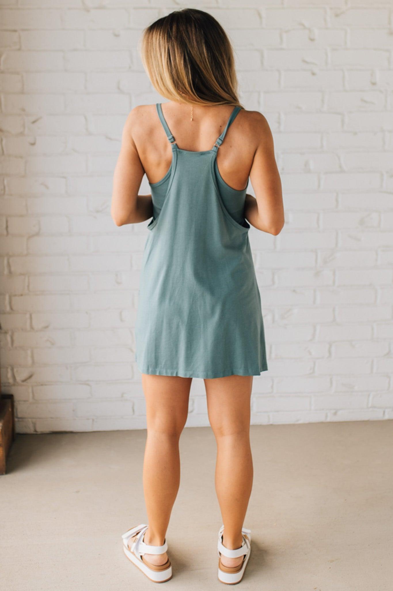 Blonde woman wearing a Mini Dress With Built-in Romper Liner.