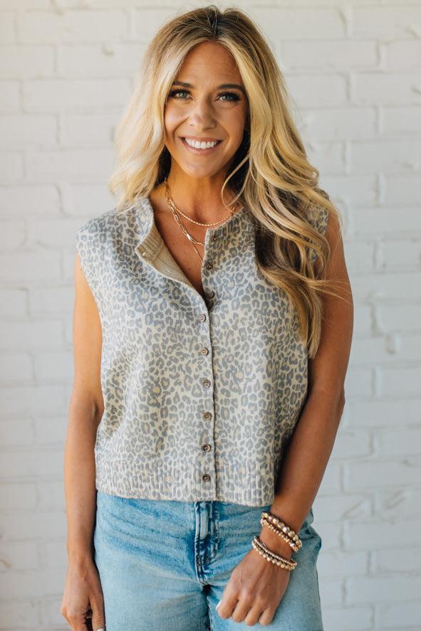 Blonde woman wearing a Vintage Leopard Print Button Front Vest Top.