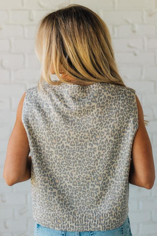 Blonde woman wearing a Vintage Leopard Print Button Front Vest Top.