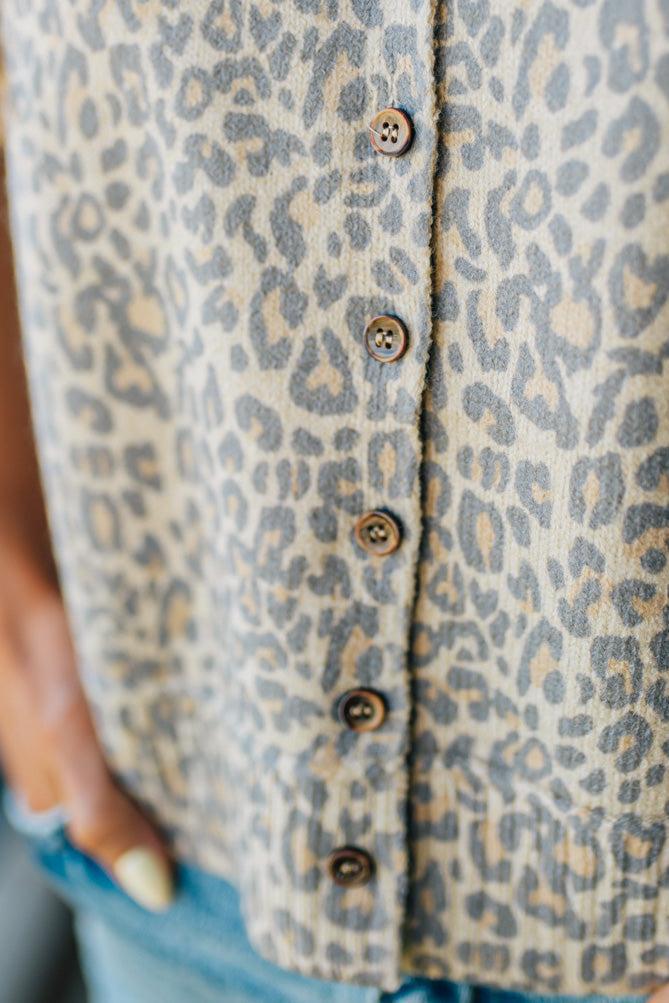 Blonde woman wearing a Vintage Leopard Print Button Front Vest Top.