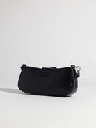 Small black handbag with large silver buckle accent and silver hardware