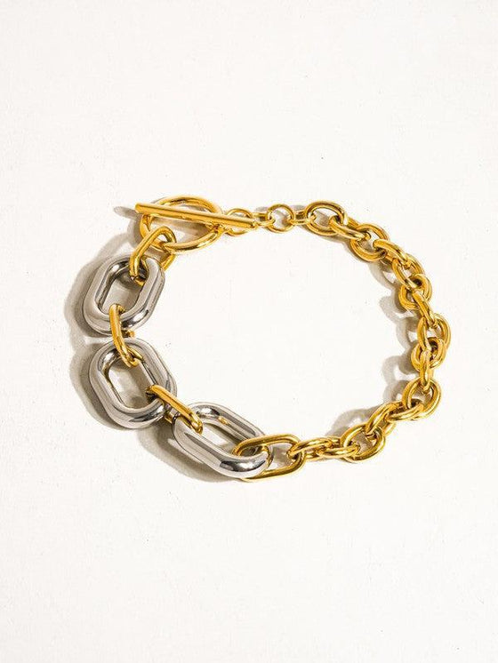 Mixed metal silver and gold multi chain bracelet