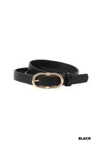 Black belt with gold buckle on a white background
