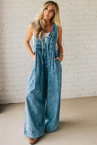 Blonde Woman Wearing a Mineral Washed Pintuck Jumpsuit With Side Pockets.