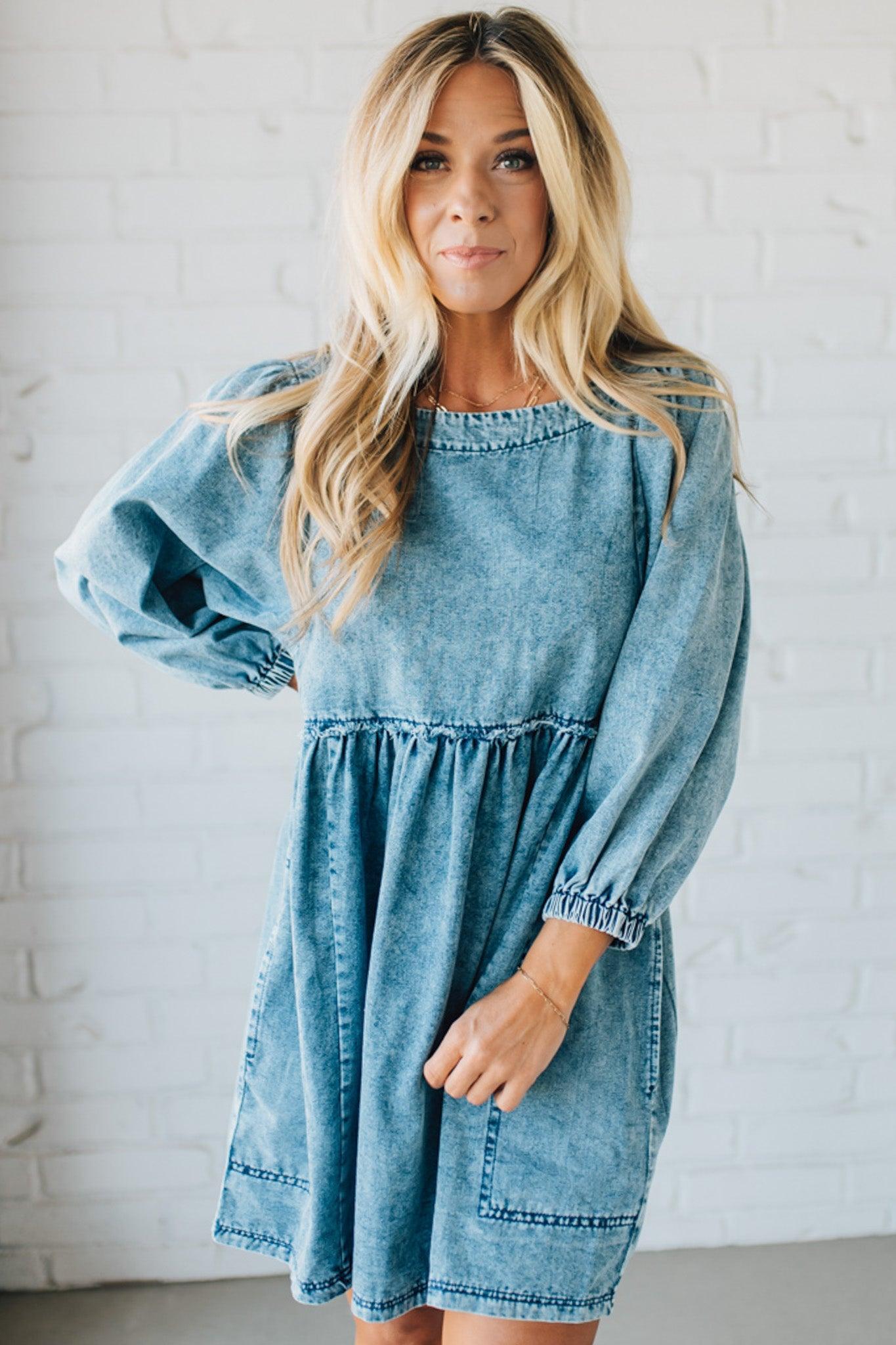 Blonde Woman Wearing a Washed And Distressed Mini Denim Dress