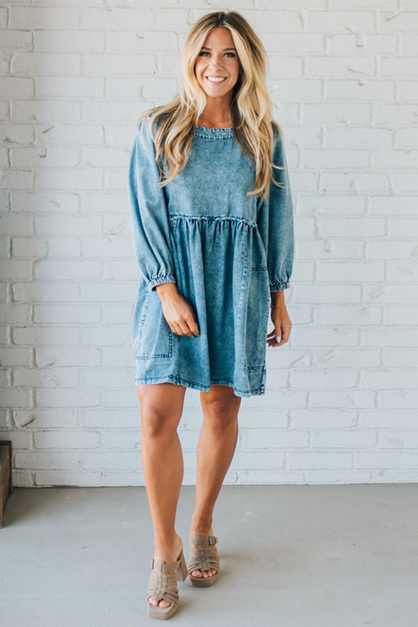 Blonde Woman Wearing a Washed And Distressed Mini Denim Dress