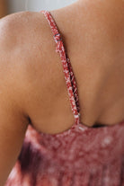Blonde woman wearing a red Paisley Print Maxi Dress With Adjustable Straps.