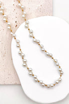 Delicate Gold Wire & Bead Accents: Features fine gold-tone wire connections accented with small polished gold bead spacers for a light, floating effect.