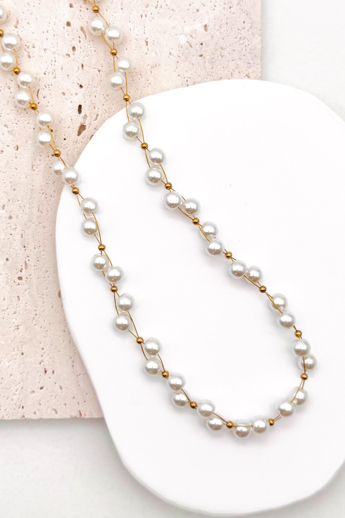 Delicate Gold Wire & Bead Accents: Features fine gold-tone wire connections accented with small polished gold bead spacers for a light, floating effect.