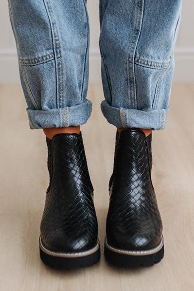 Black classic Chelsea silhouette with a woven, intrecciato-inspired finish and bold lug sole, crafted from atelier-selected materials. Grounded by our signature DreamCloud cushioned sole